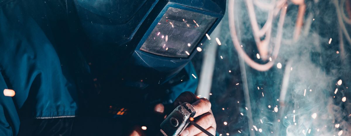 welder using welding machine