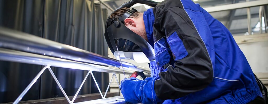 welder working on steel